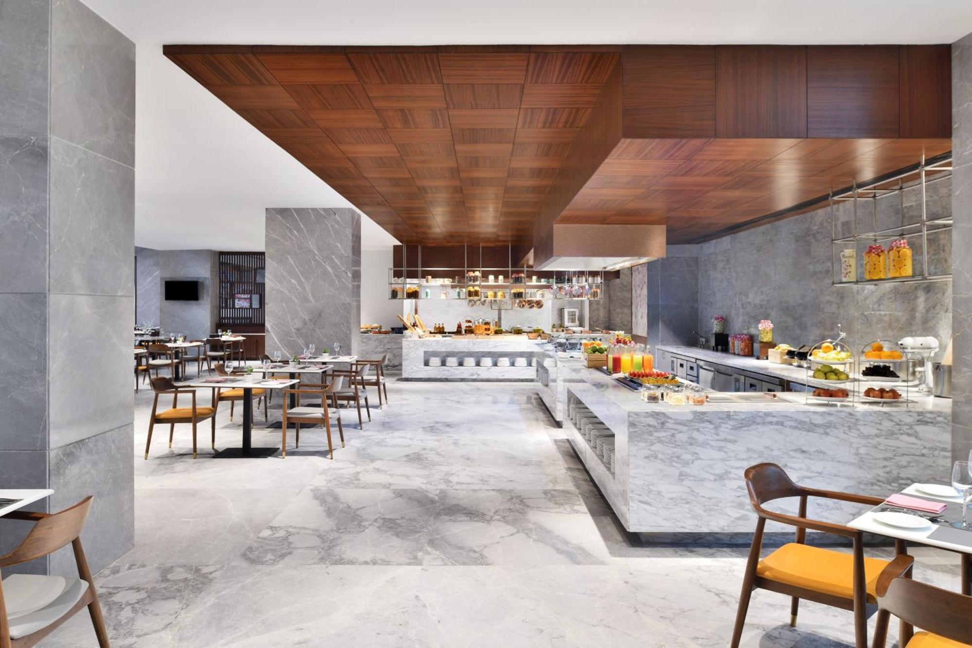 Le Meridien Haydarabad Dış mekan fotoğraf The Kitchen Table